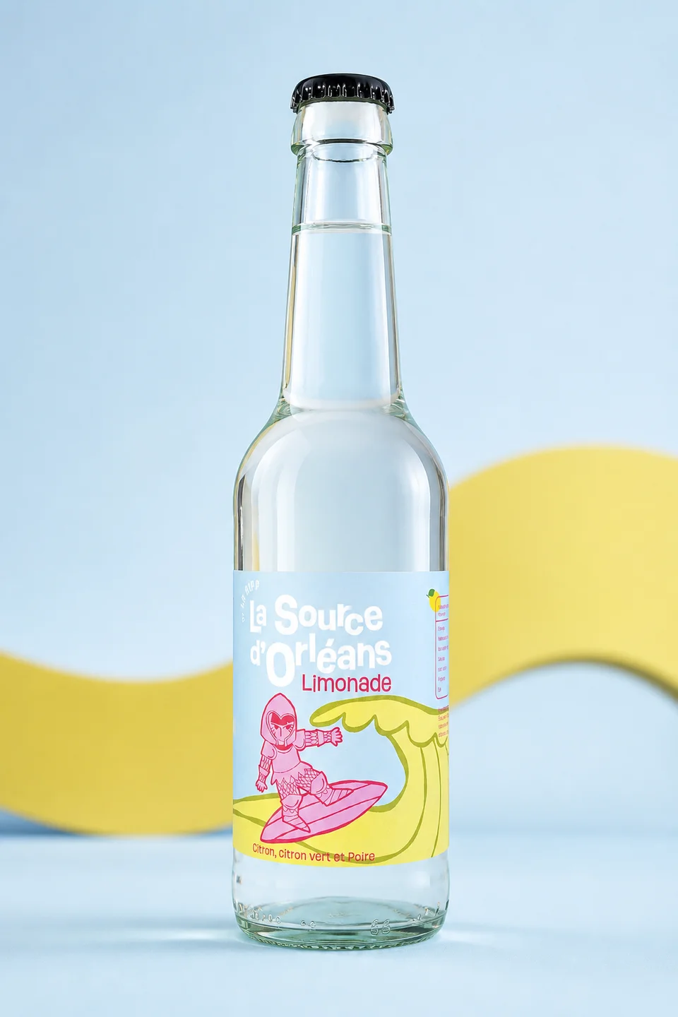 La limonade La Source d’Orléans, bouteille transparente aux saveurs citron, citron vert et poire